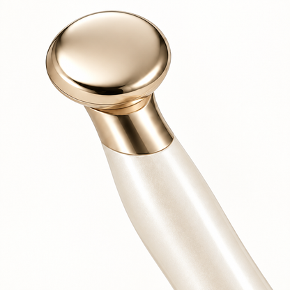 Close-up of circular gold-tone head and neck