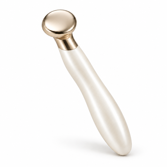 Pearl-white beauty wand with gold-tone head on white background